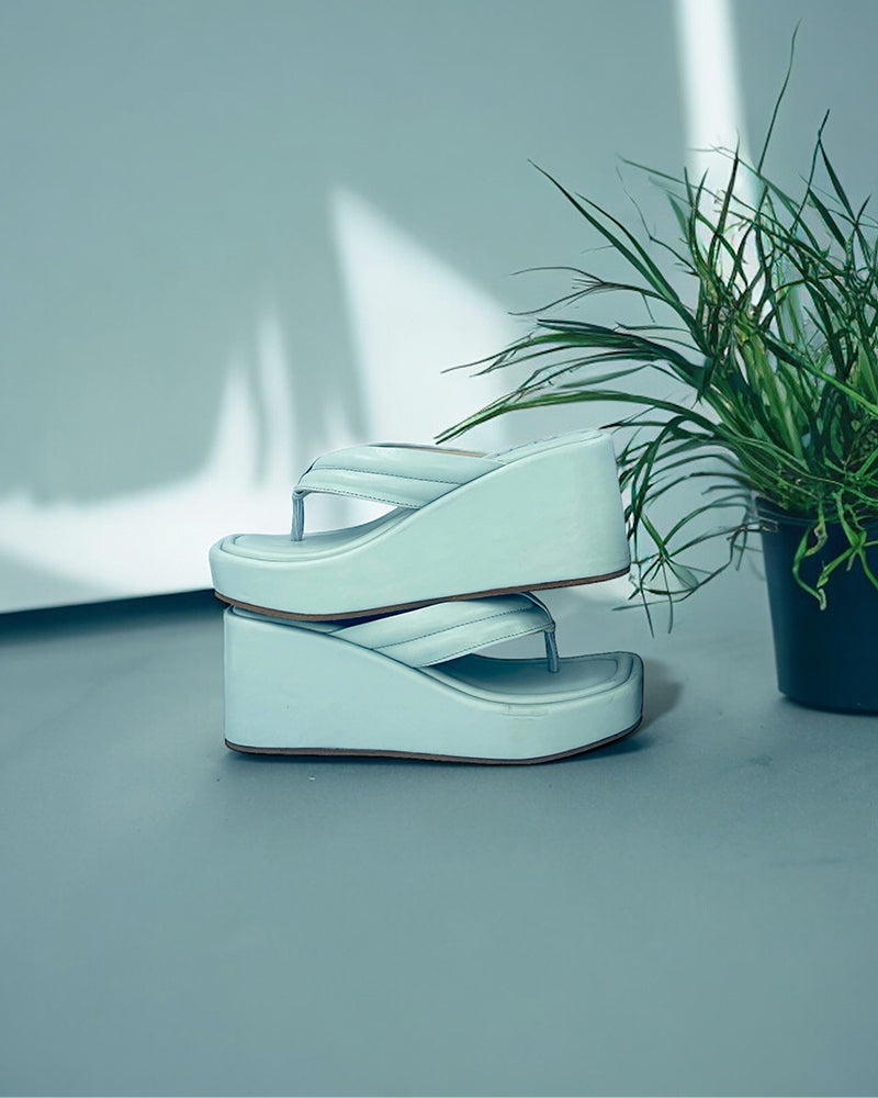 Blue Way too Simple Slides with 3-inch platform wedge and open toe design in light blue vegan leather