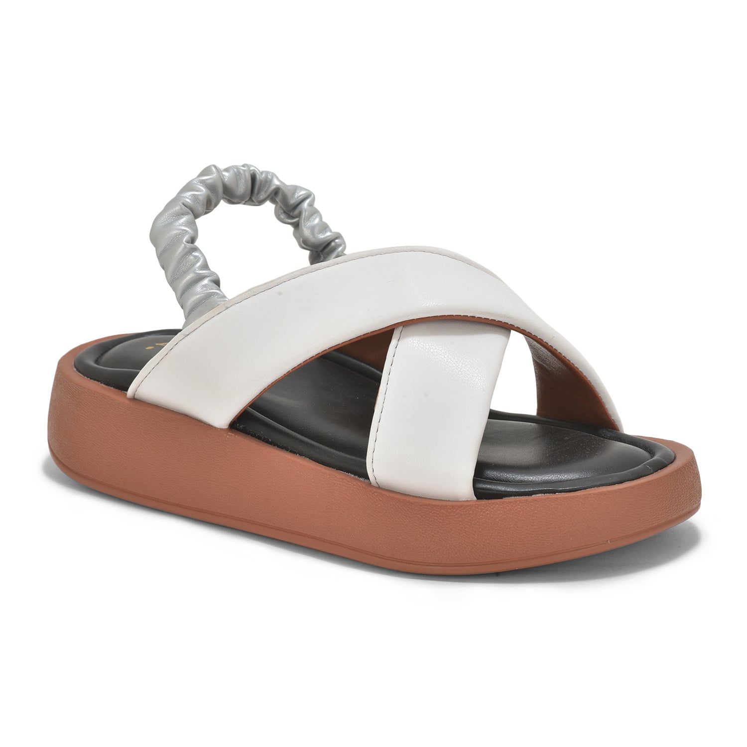 White dual criss-cross strap sandal with cushioned black insole and brown lightweight platform sole