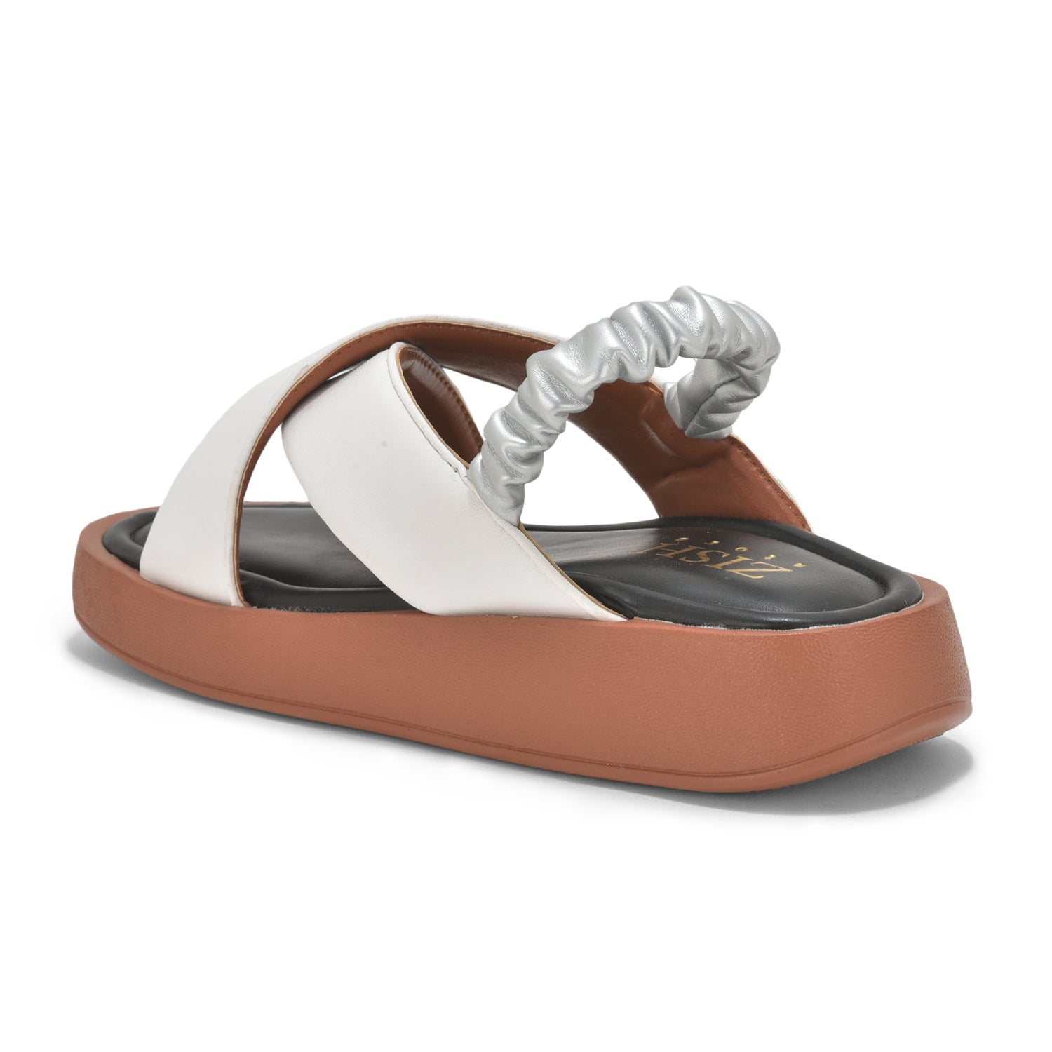 Dual Criss-Cross Sandals with textured white straps, cushioned black insole, tan lightweight platform sole, and elastic back strap for a secure fit.