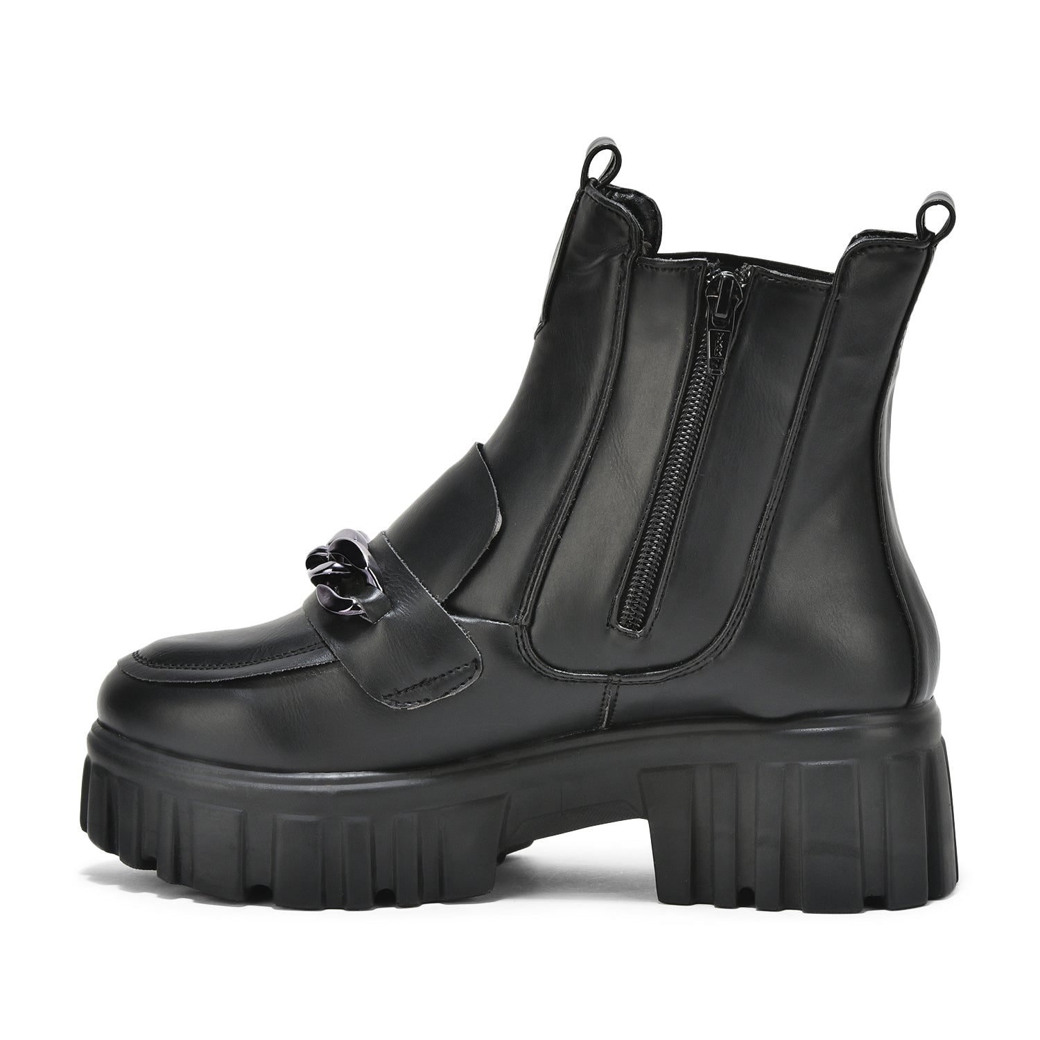 Black handcrafted ankle boots with side zipper, chunky sole, and front buckle detail