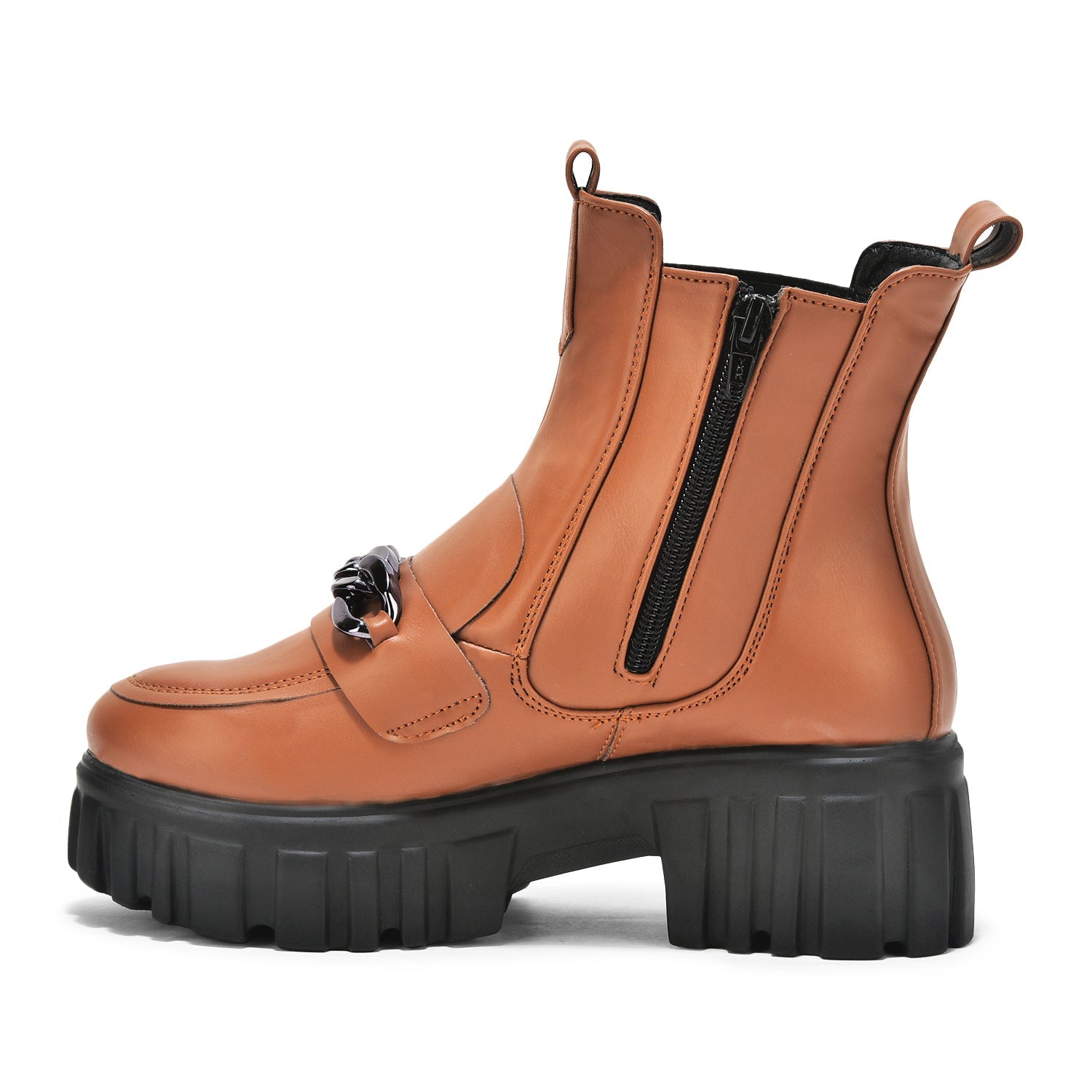 Tan handcrafted ankle boot with side zipper, elastic panels, and black chunky sole.