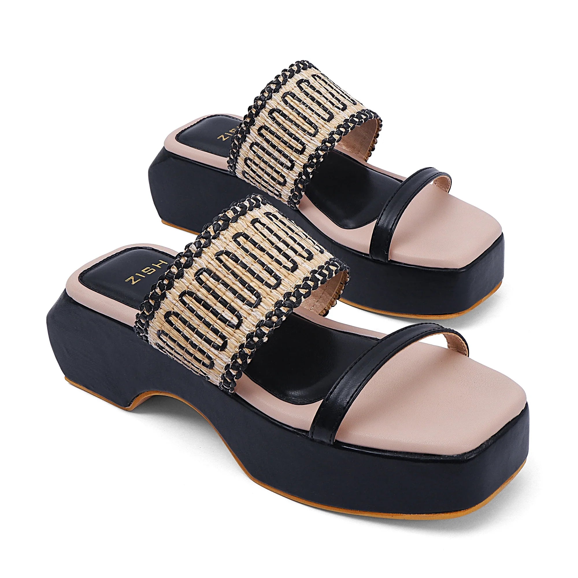 Black Austin heels with open toe, cane detailing, and platform sole for casual comfort and style