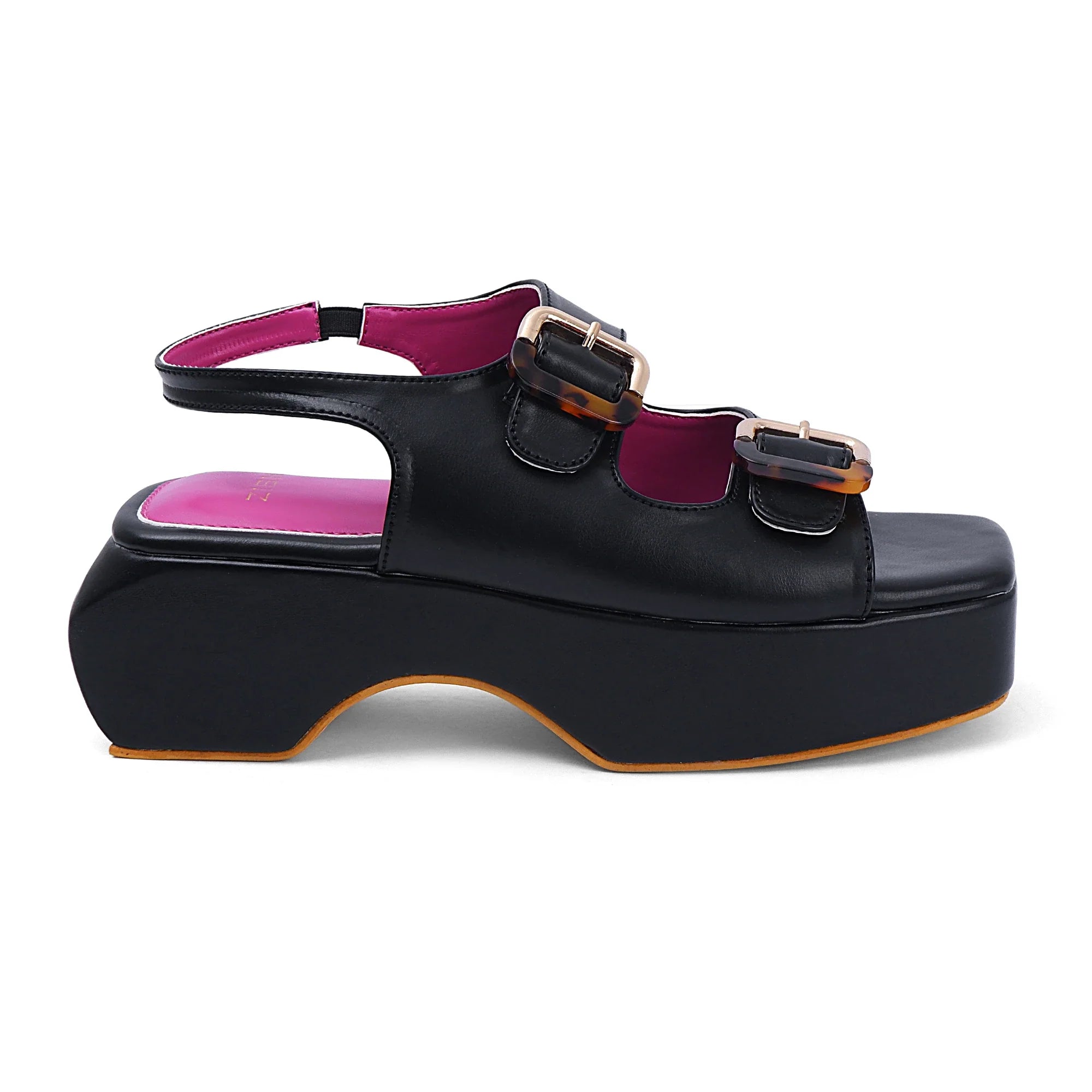 Black Lucy heels with open-toe design, PU leather, dual buckle straps, and chunky TPR sole for casual comfort and style