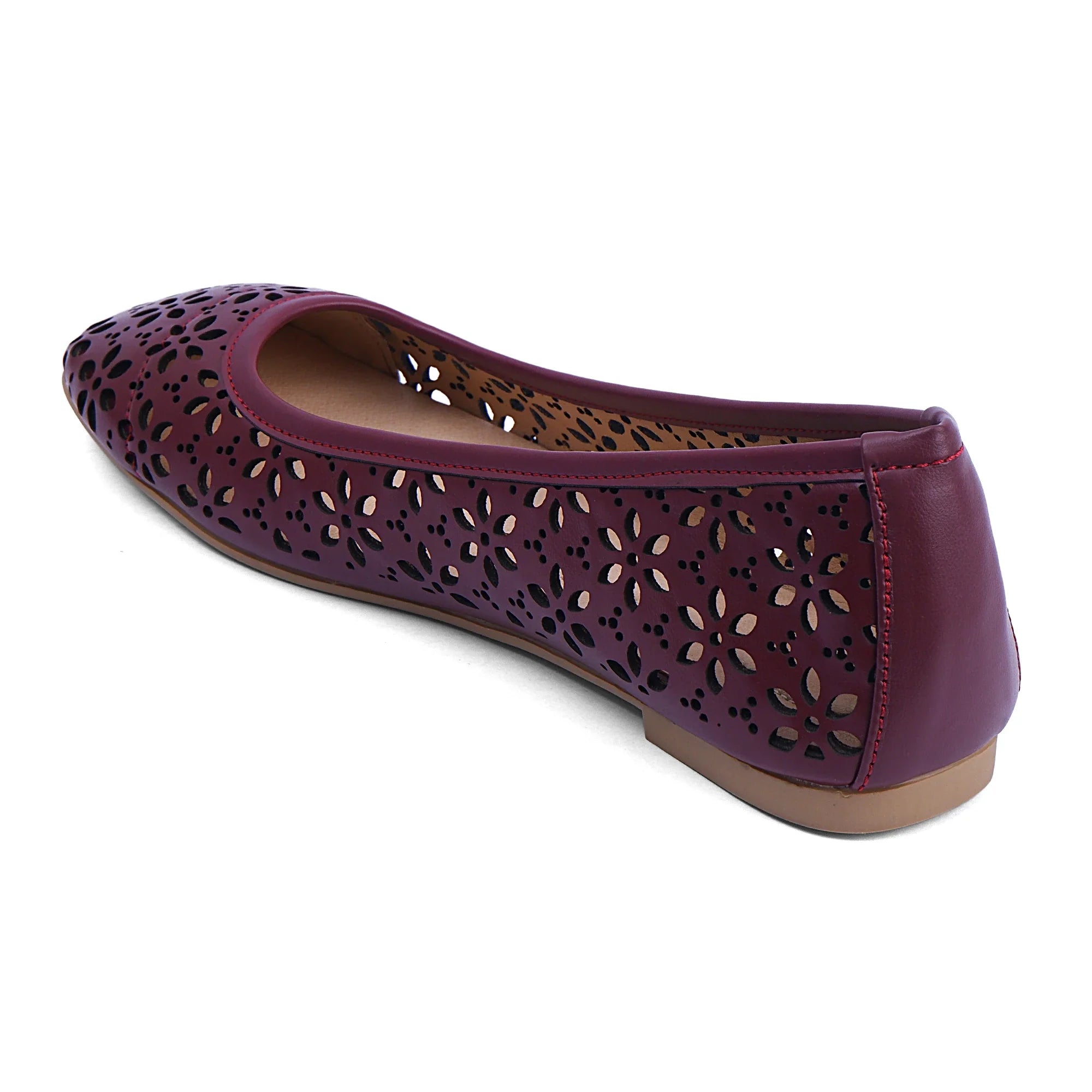 Maroon Charlotte leather shoes with laser-cut floral design and closed-toe silhouette