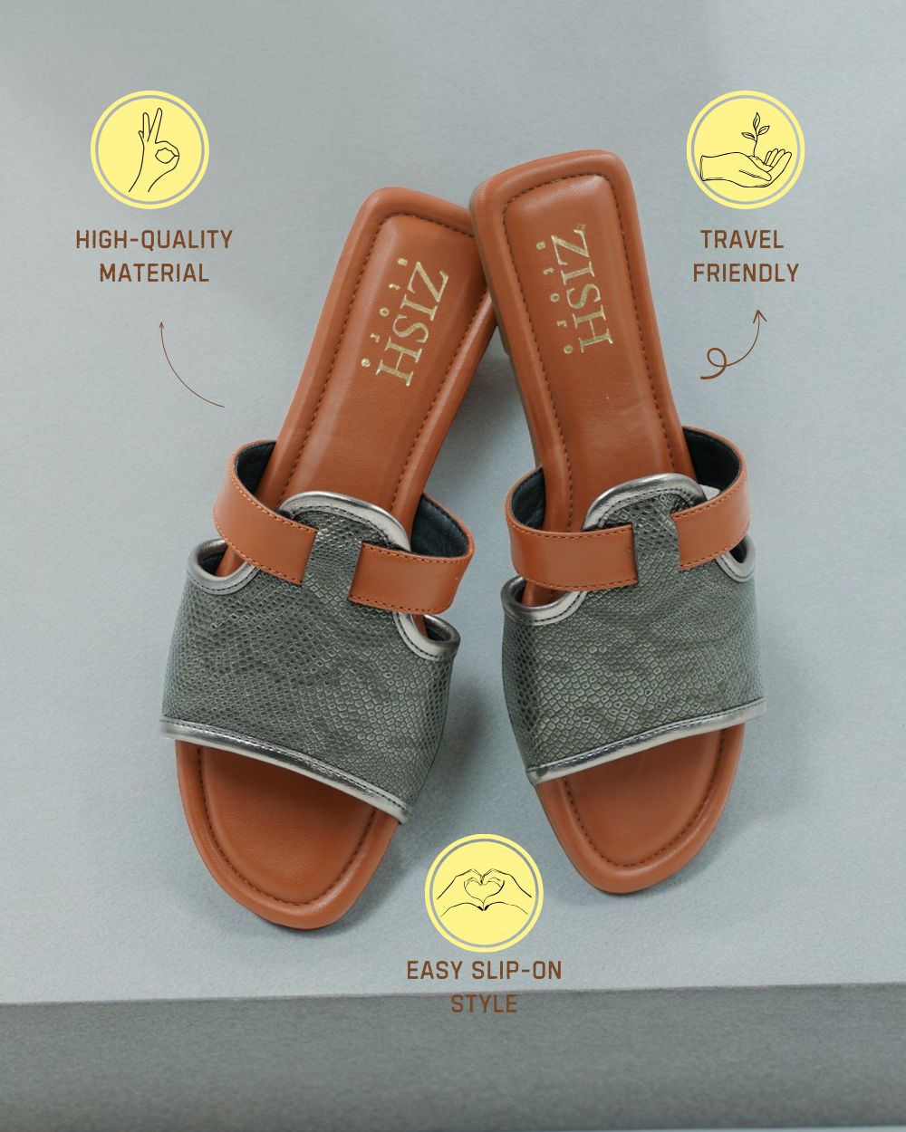 Gunmetal Meghan Flats with woven strap design, open toe, flat heel, and cushioned footbed in grey vegan leather.