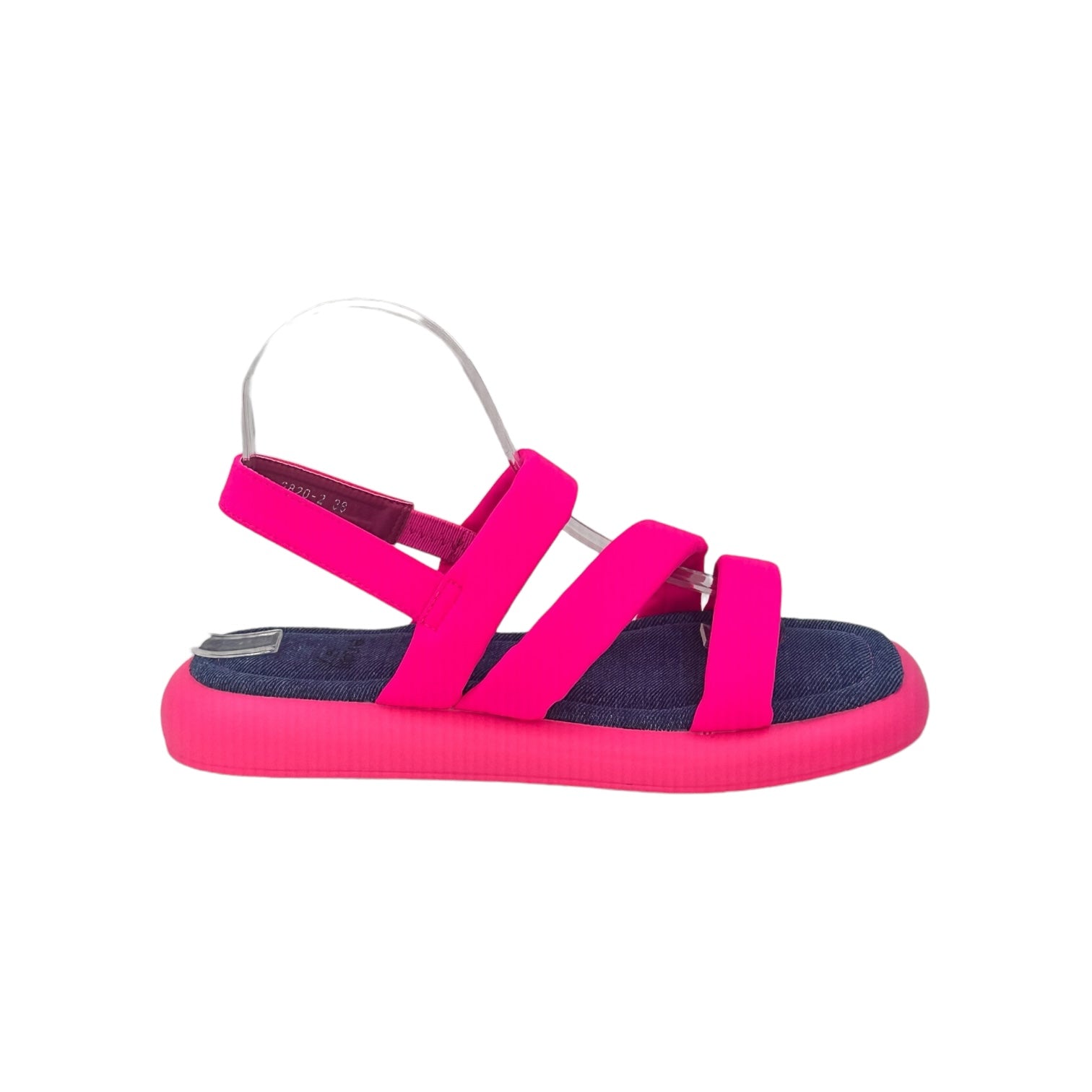 Hot pink beach-inspired sandals with elastic straps and flat sole for casual summer wear