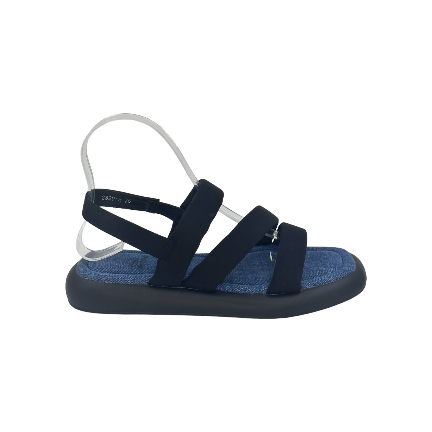 Black beach-inspired flat sandals with elastic straps and PU sole for casual and beachwear.