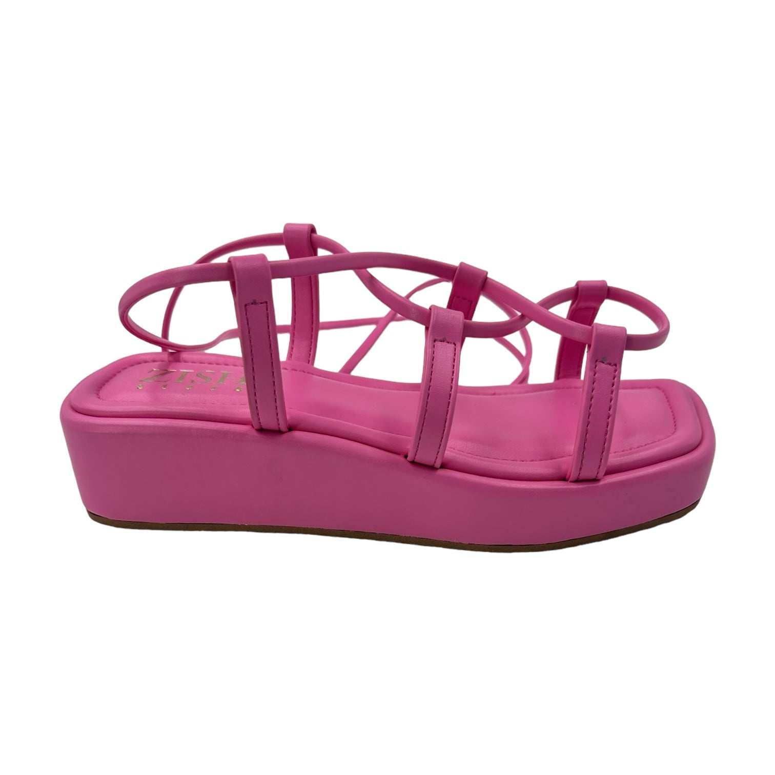 Pink platform tie-up sandals with 1-inch sole and open toe design made of vegan leather
