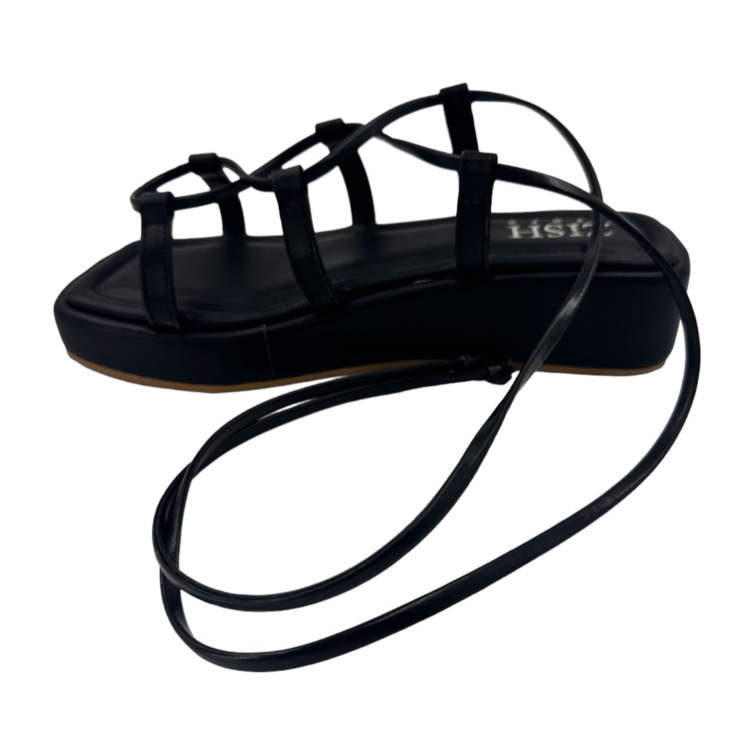 Black vegan leather platform tie ups flats with a 1-inch sole and open toe design