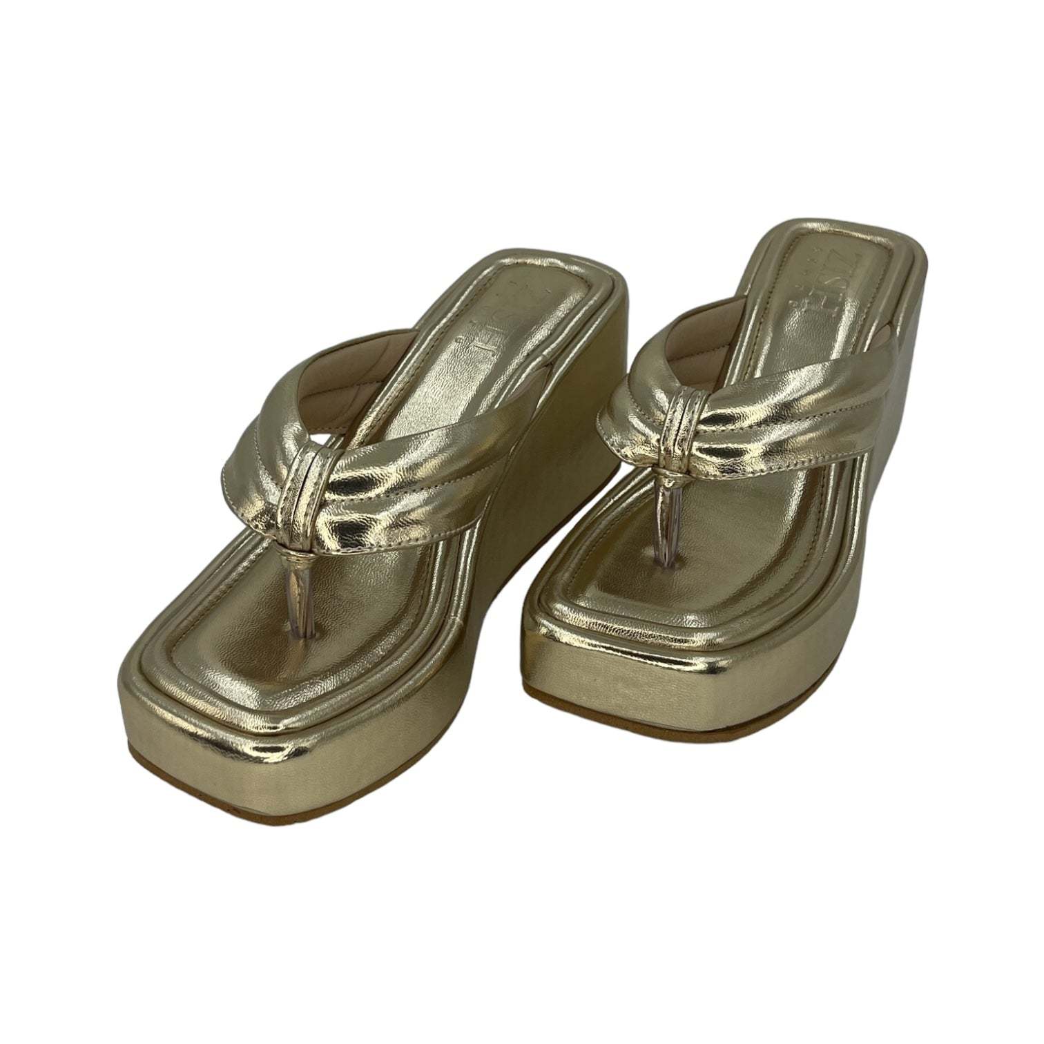 Gold vegan leather platform wedge slides with open toe and simple strap design