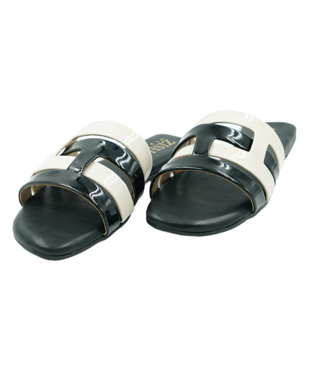 Black Azzura Flats with black and white geometric open-toe design, flat PU vegan leather sandals for casual and formal wear