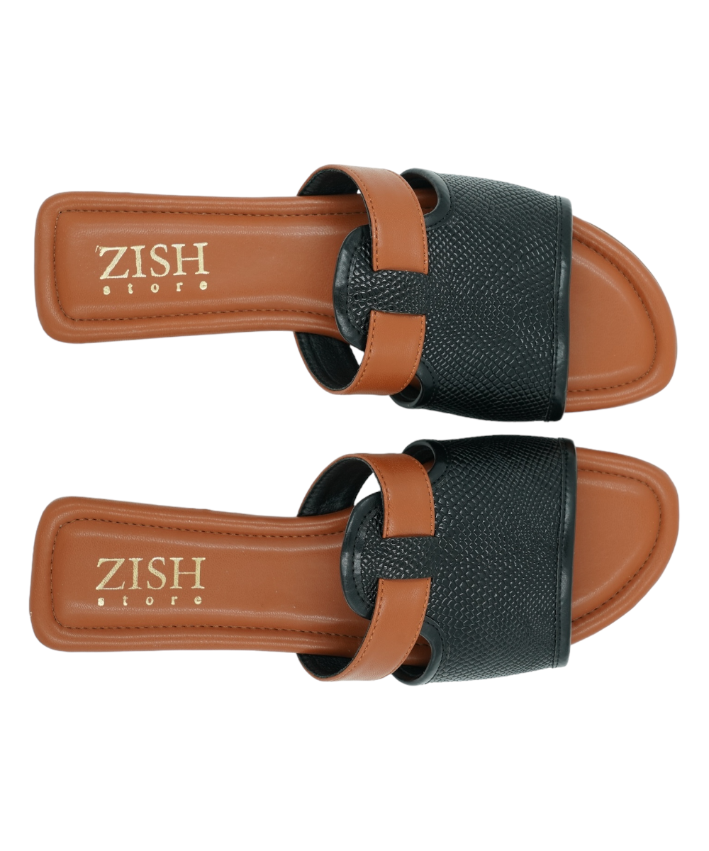 Black Meghan Flats with woven textured strappy design and brown cushioned footbed, flat open-toe sandals for casual and formal wear.