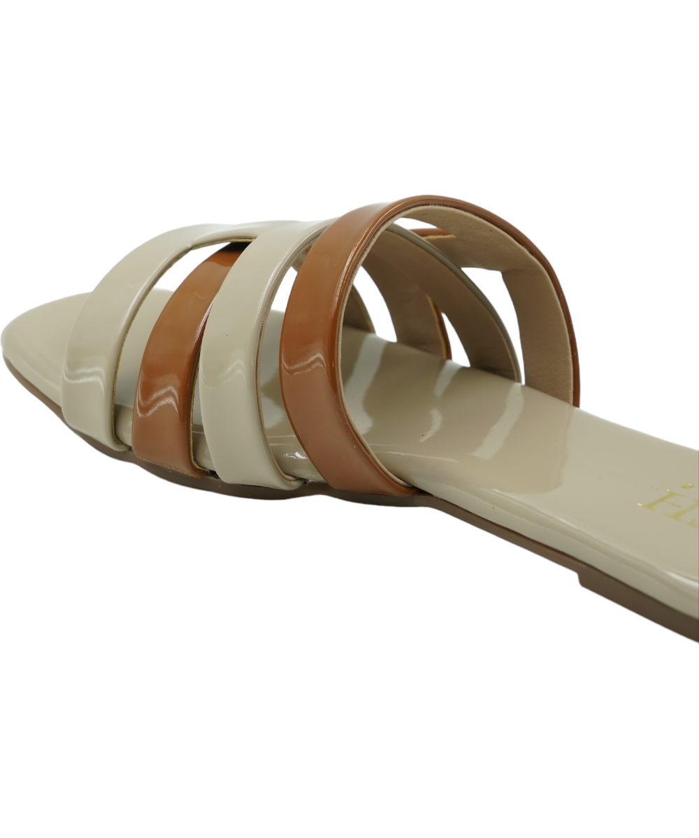 Beige Azzura Flats with geometric design, open toe, flat heel, made of PU vegan leather with beige and tan straps.