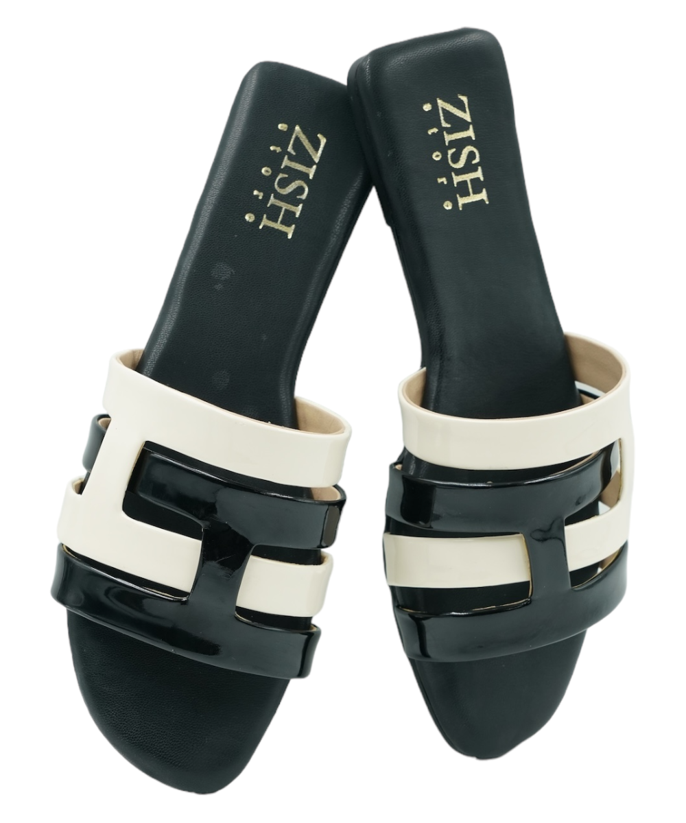Black Azzura Flats featuring black and white geometric open-toe design in vegan leather with flat PVC sole for casual and formal wear