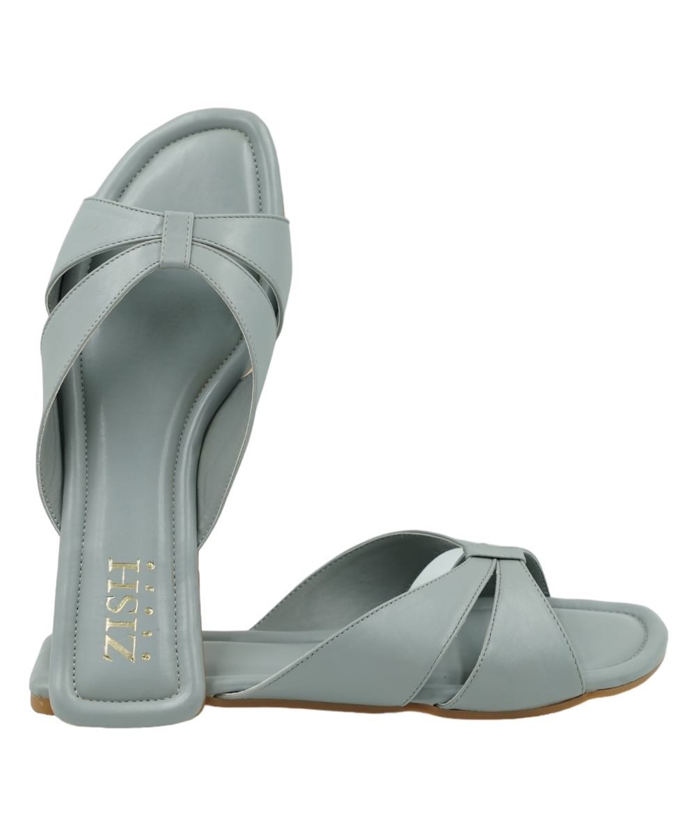 Grey cross-strap flats with cushioned insoles and open toe design in vegan leather