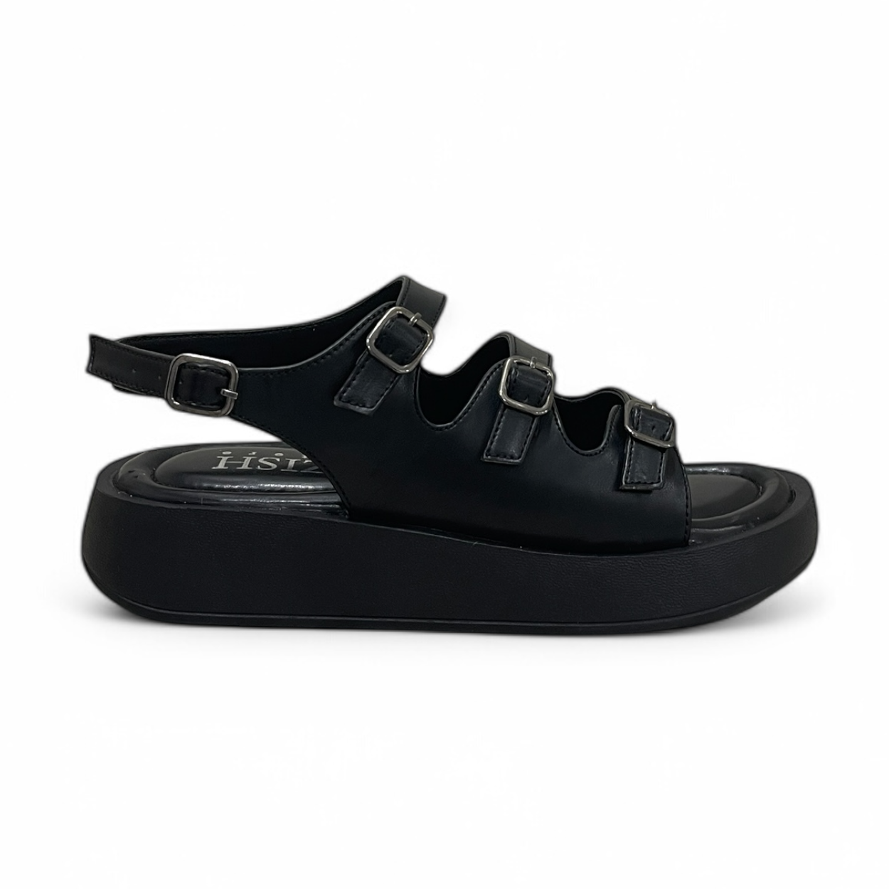 Black triple buckle sandals with cushioned footbed and adjustable straps, made of vegan leather for casual and semi-formal wear.