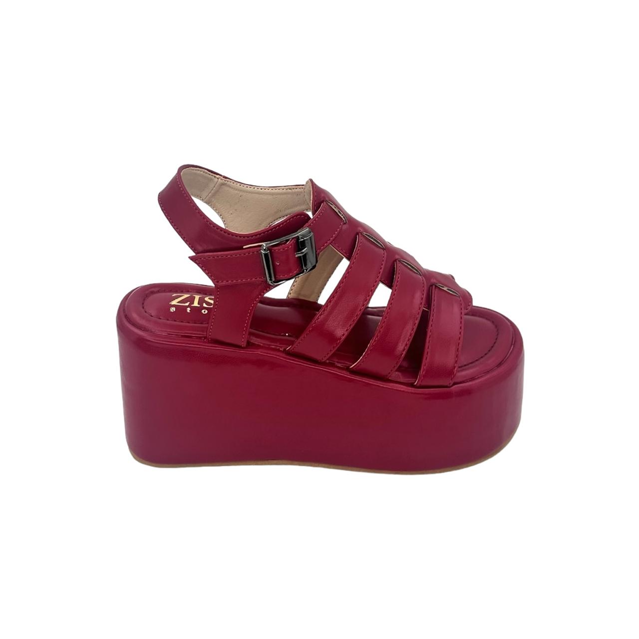 Red chunky heel platform caged sandals with open toe and buckle strap in vegan leather