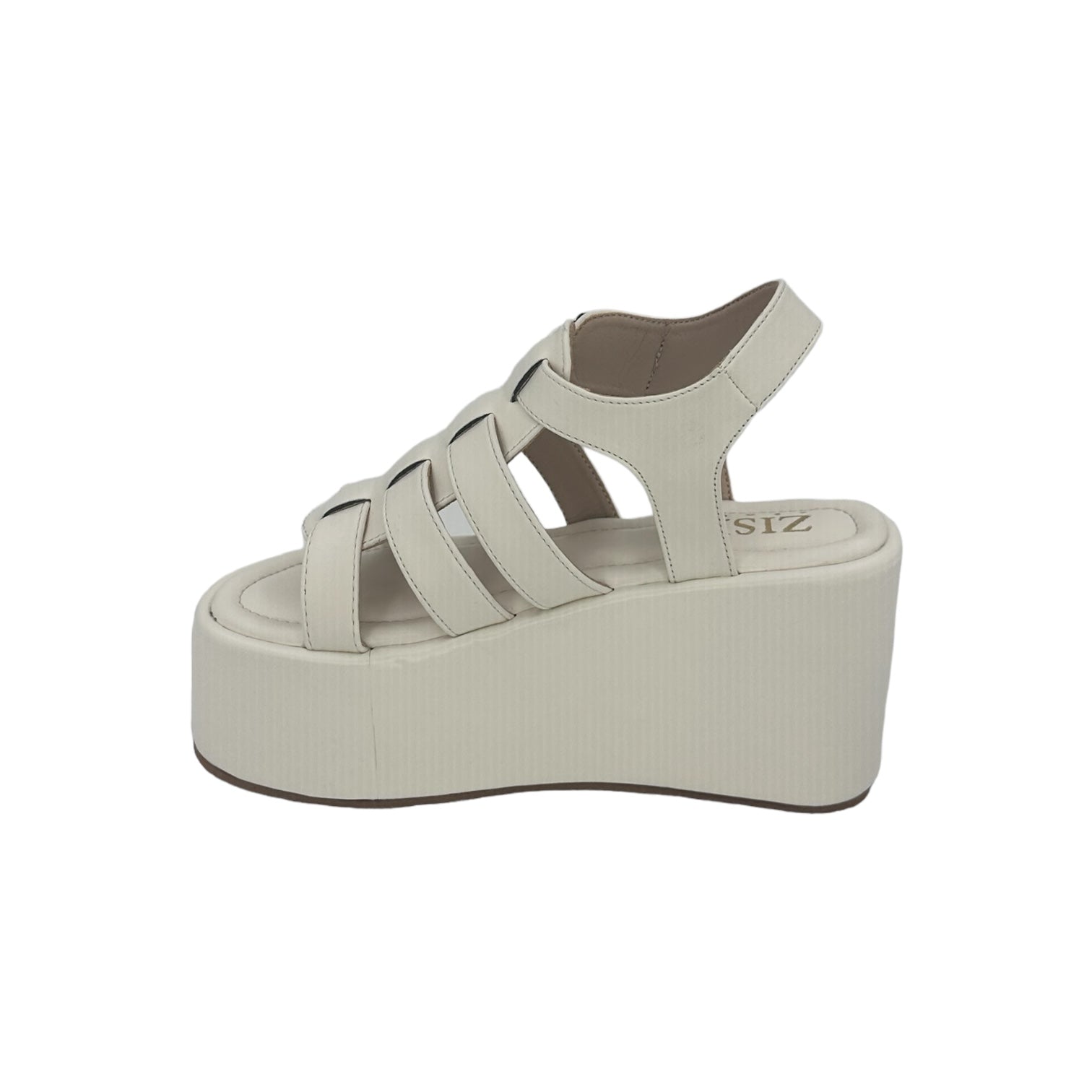 White chunky heel caged platform sandal with open toe and vegan leather straps