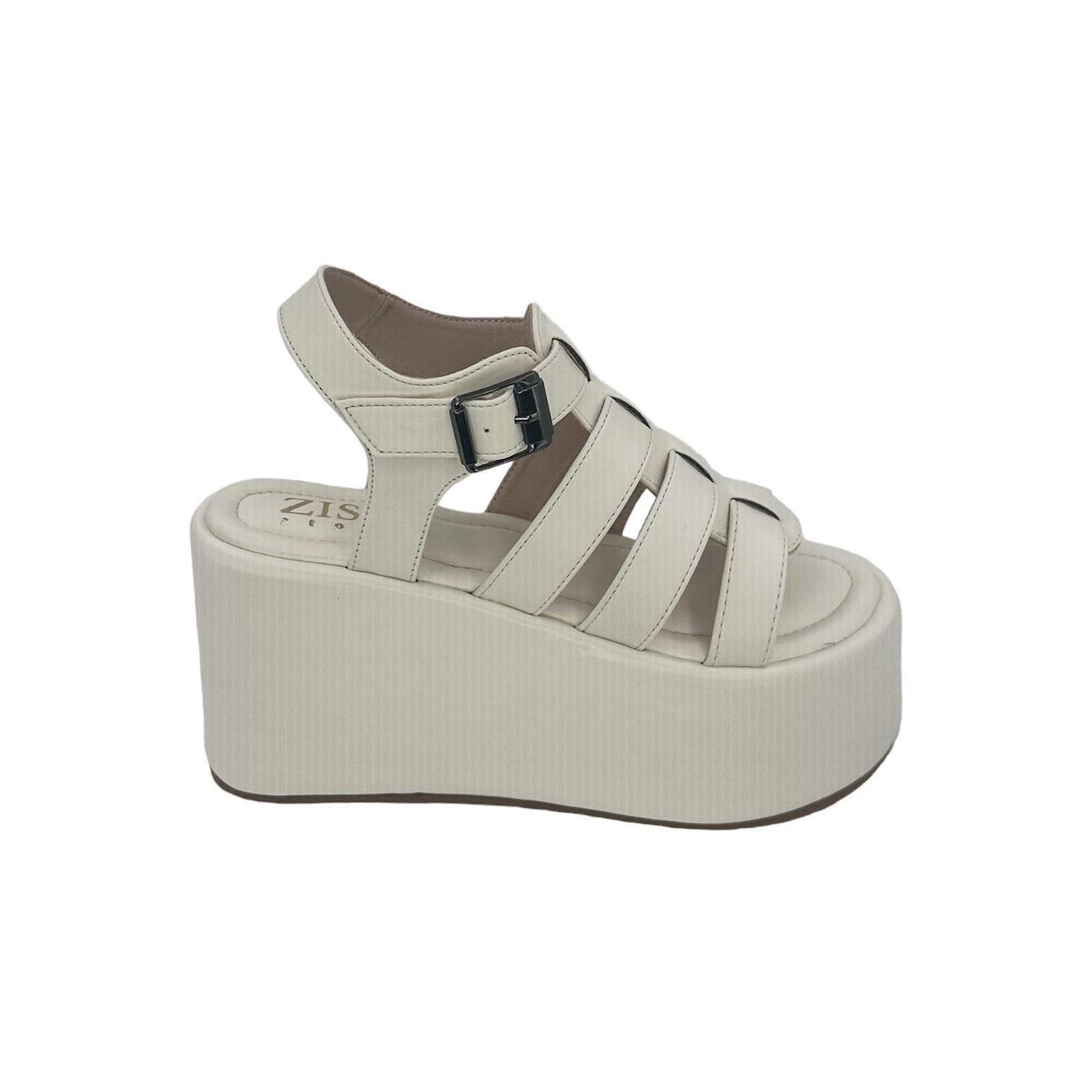 White chunky heel caged platform sandals with open toe and buckle strap closure