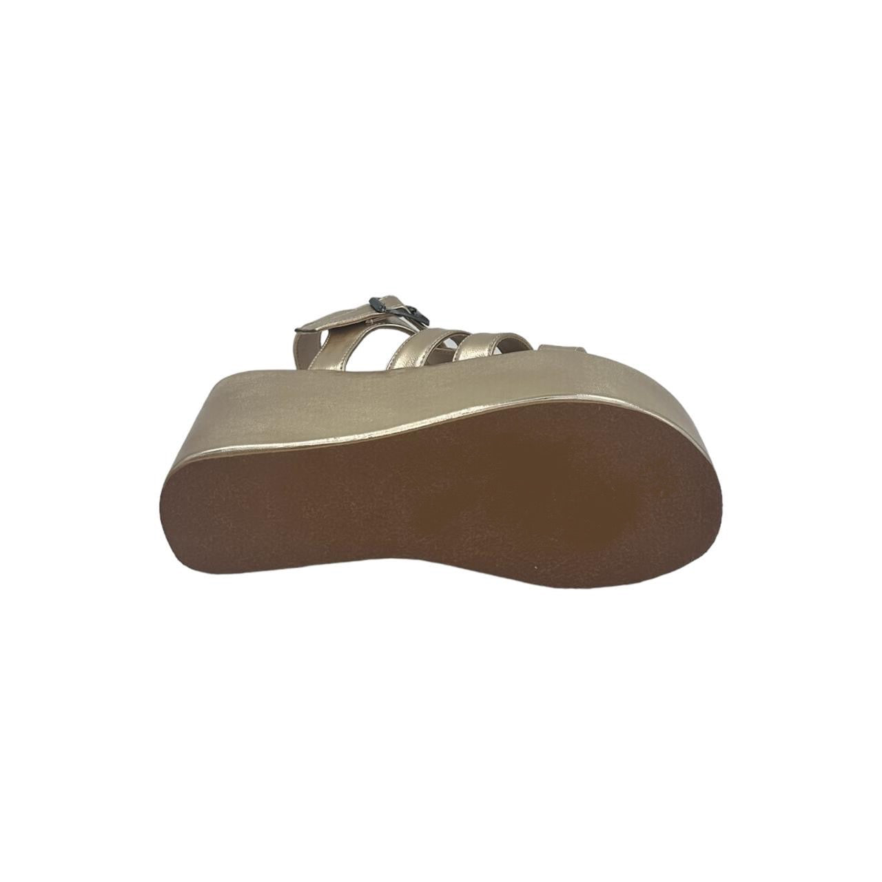 Golden chunky heel caged sandal with platform sole and open toe design