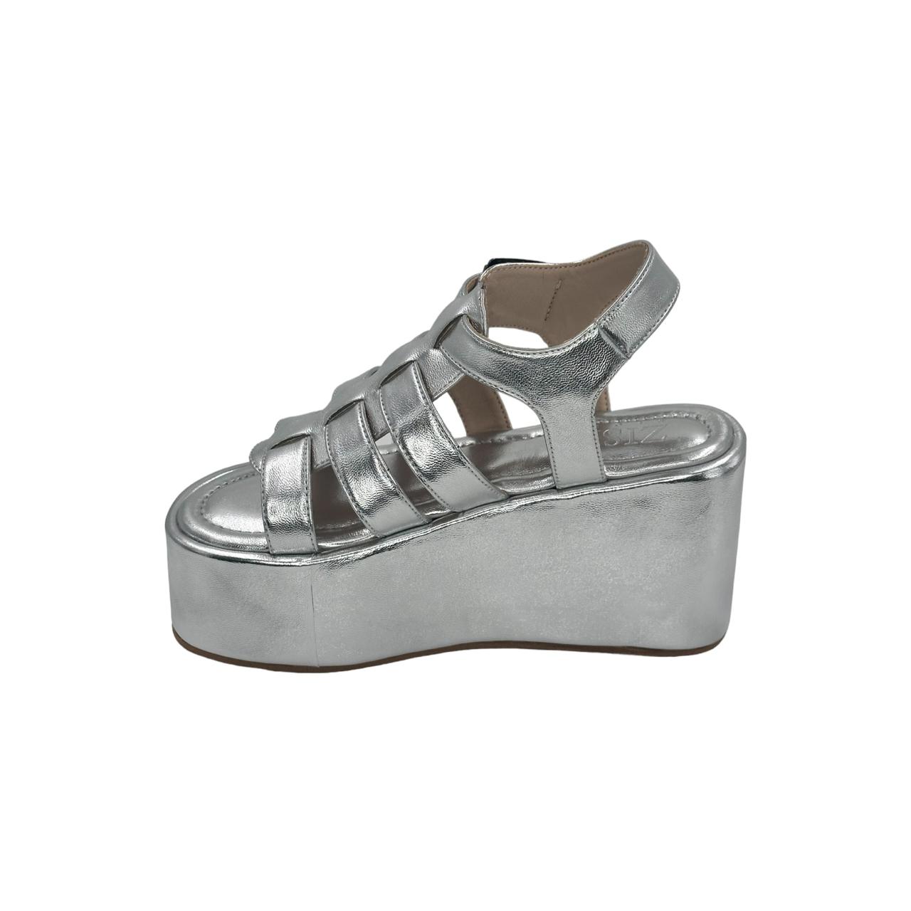 Silver chunky heel caged platform sandals with open toe and vegan leather upper
