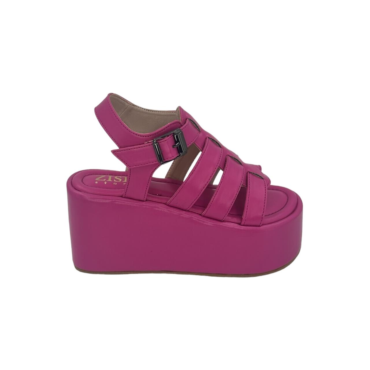 Hot pink chunky heel caged platform sandal with open toe and ankle strap buckle closure