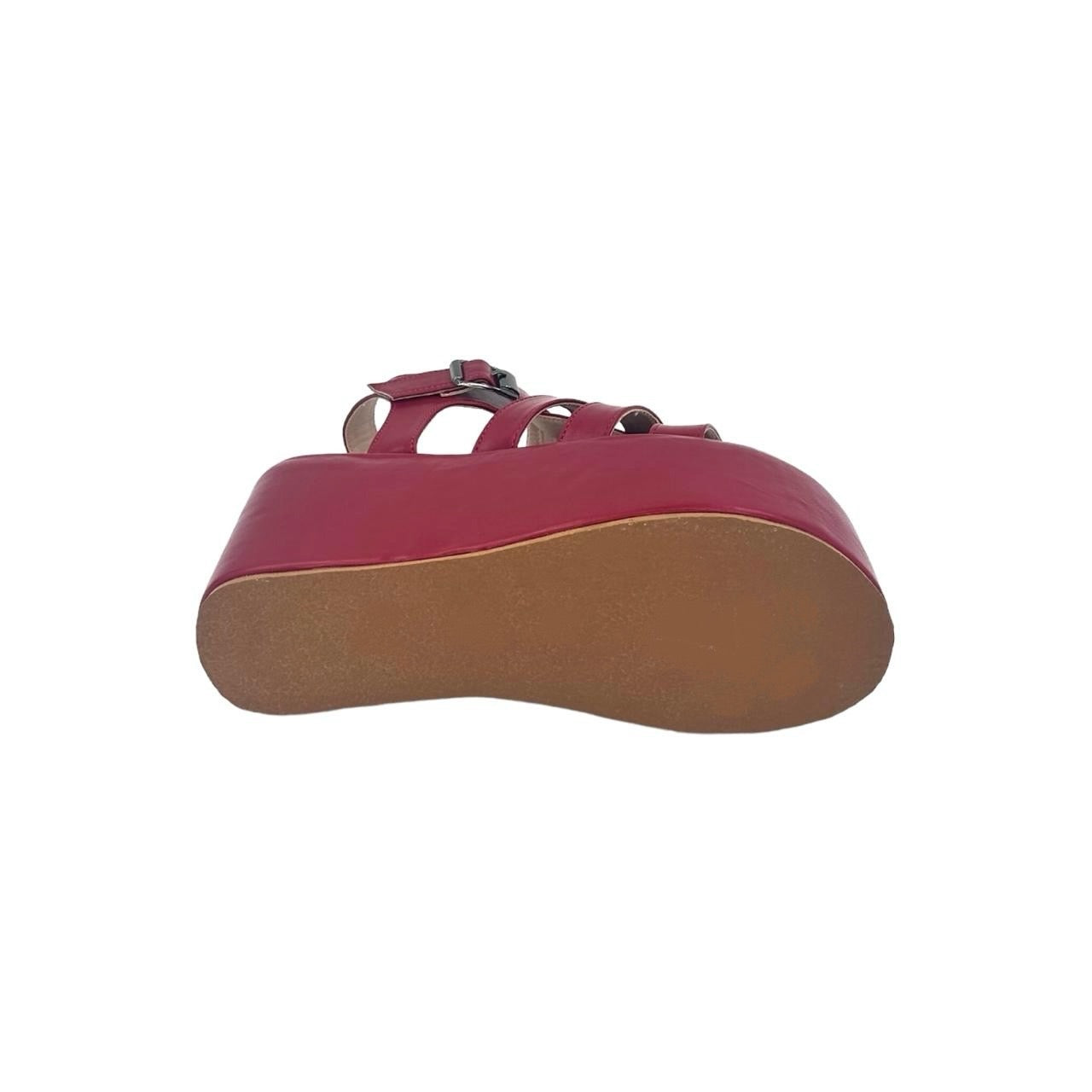 Hot pink caged platform sandal with 3.5 inch chunky heel and TPR sole viewed from bottom