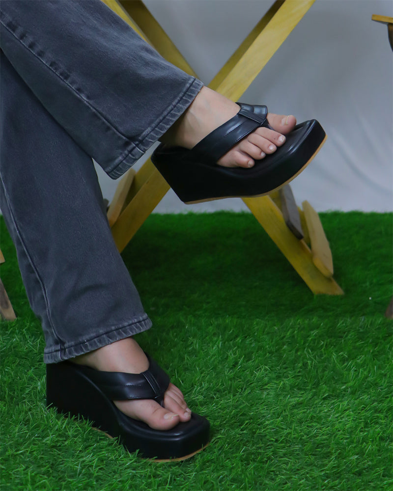Black Way too Simple Slides with 3-inch platform wedge heel and open-toe strap, made of black PU vegan leather.