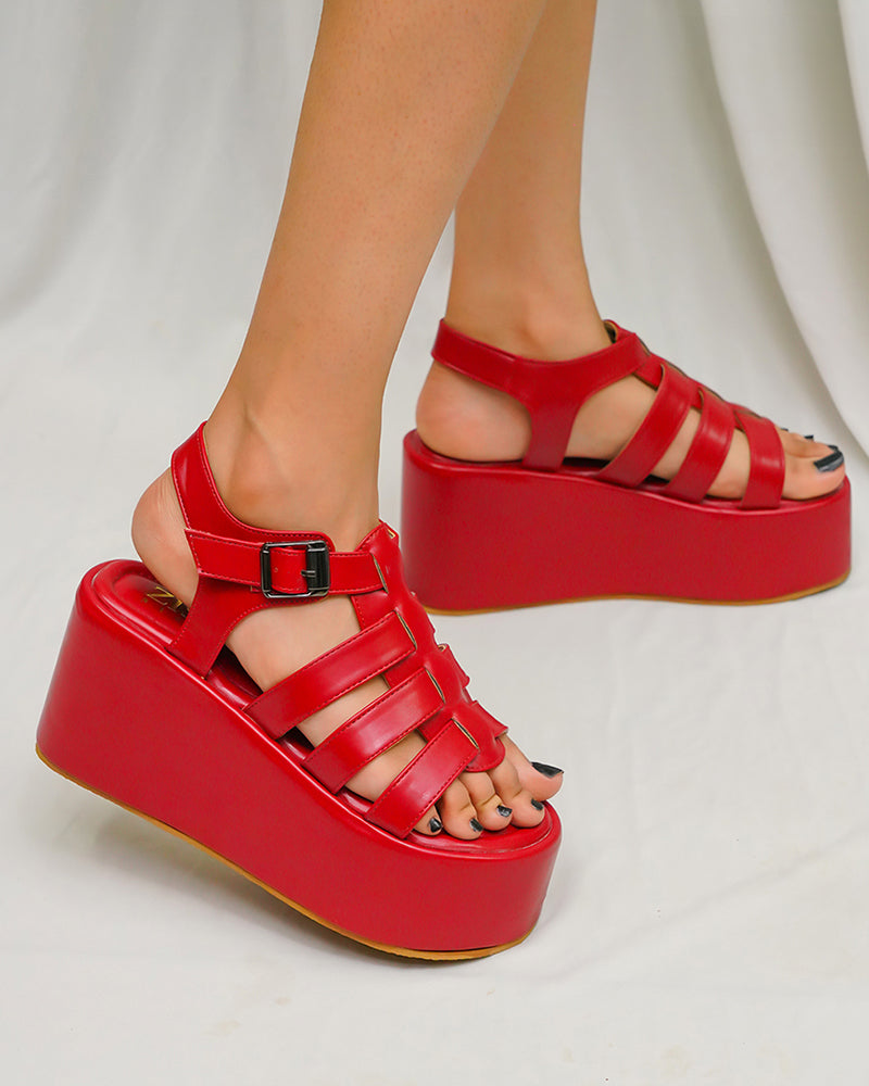 Red caged platform sandals with chunky 3.5-inch heel and buckle closure