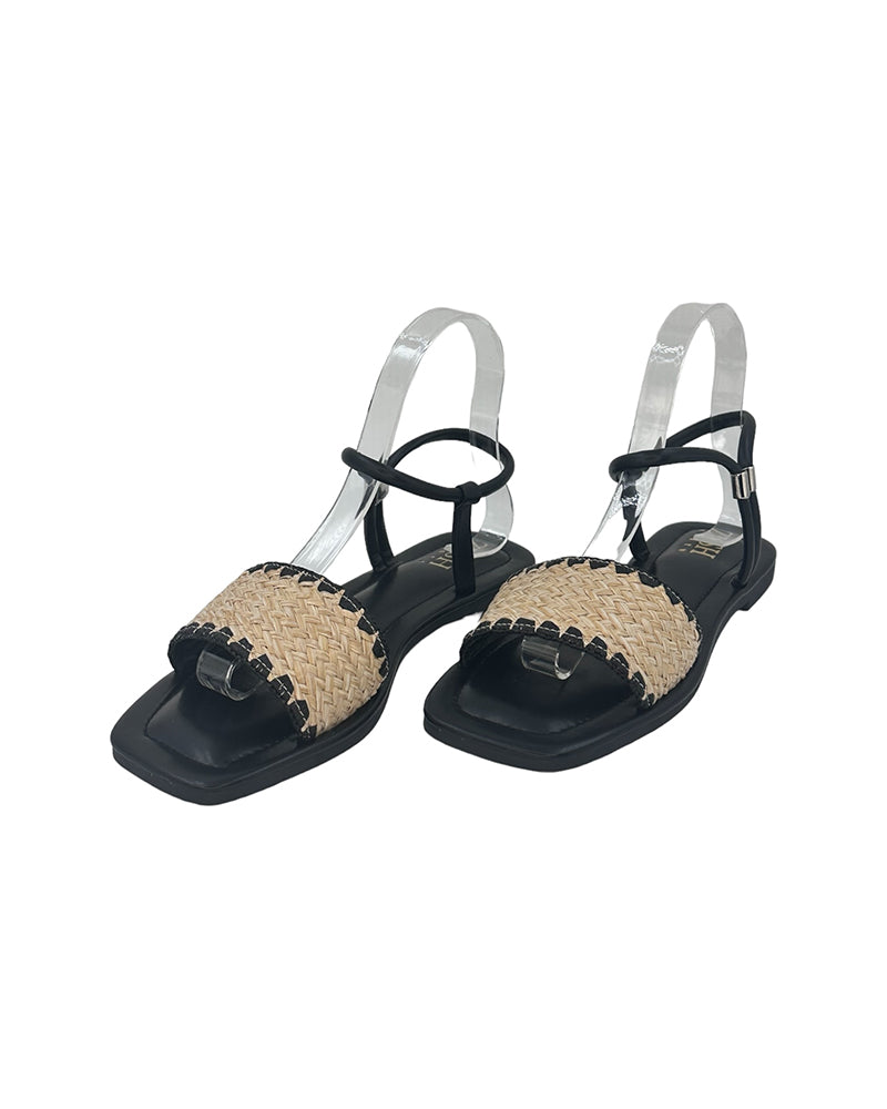 Black Ocean Walker Sandals with cane upper, open toe, flat TPR sole, and black PU vegan leather straps.