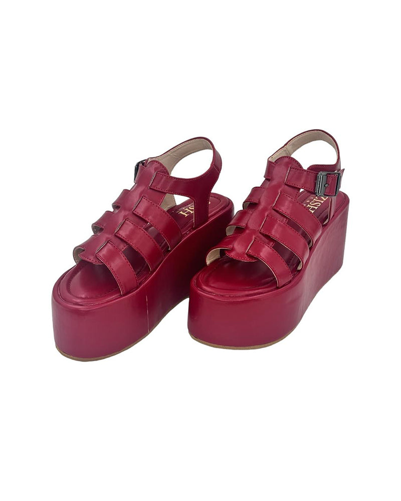 Red chunky heel caged platform sandals with open toe and adjustable ankle strap in vegan leather