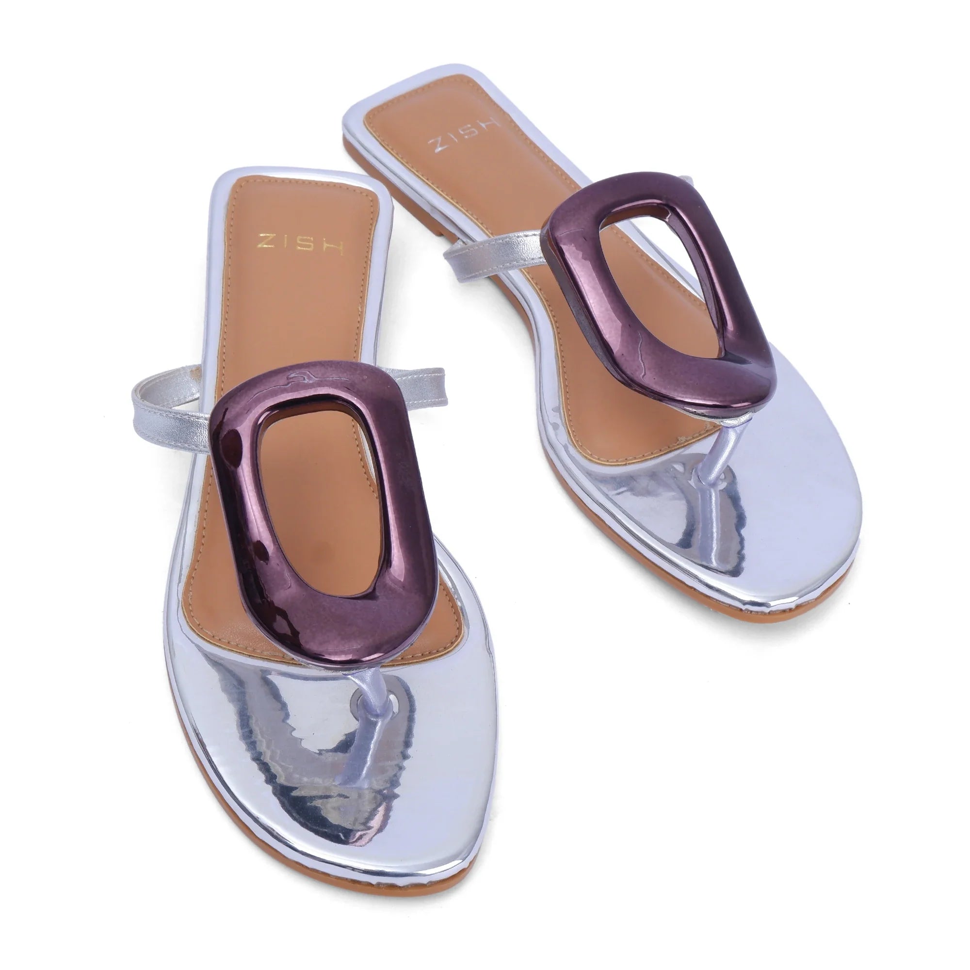 Pair of gunmetal open-toe vegan flats with minimalist buckle detail and PVC sole