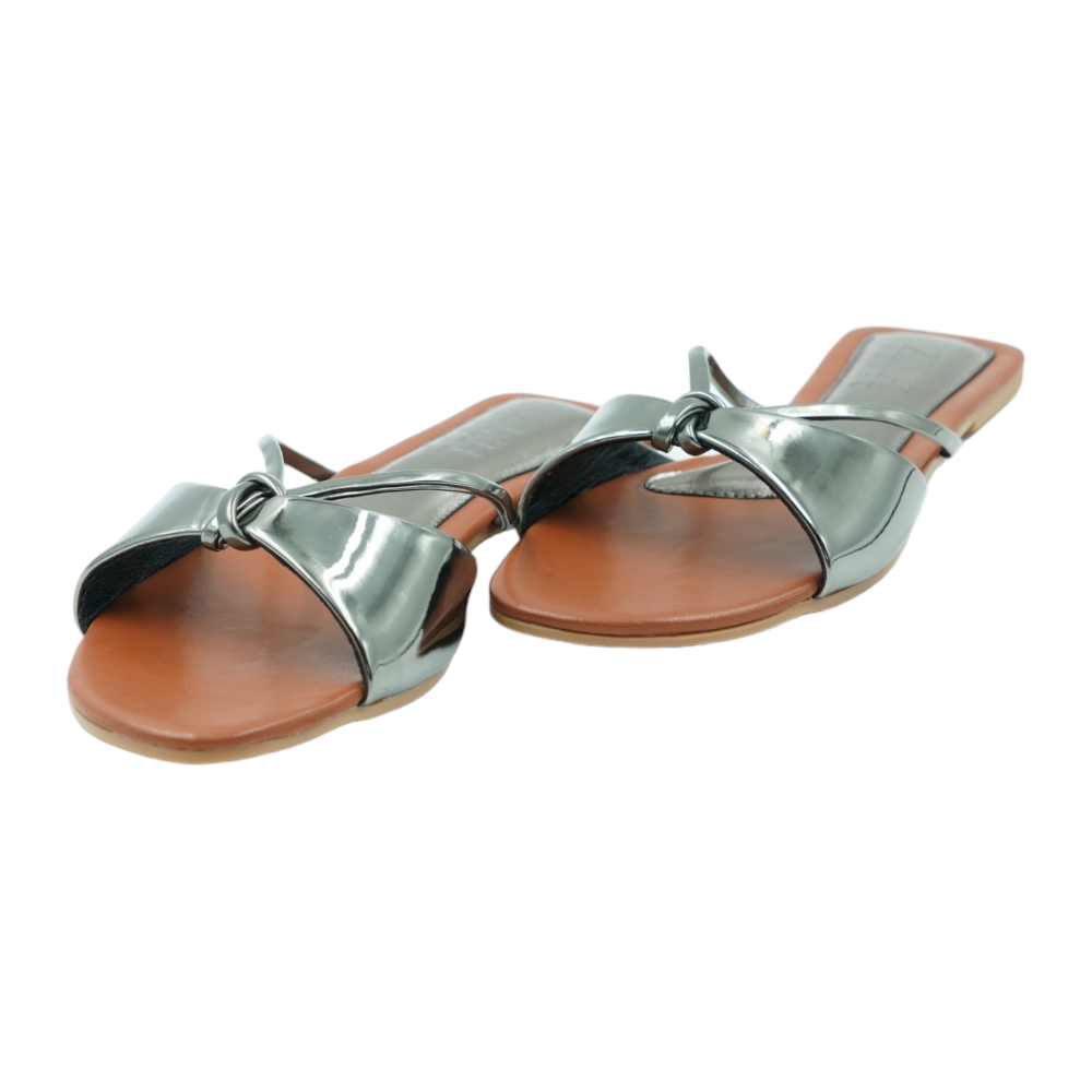 Gunmetal Carolina Flats with glossy mirror strap and brown footbed, open-toe flat sandals in PU vegan leather.