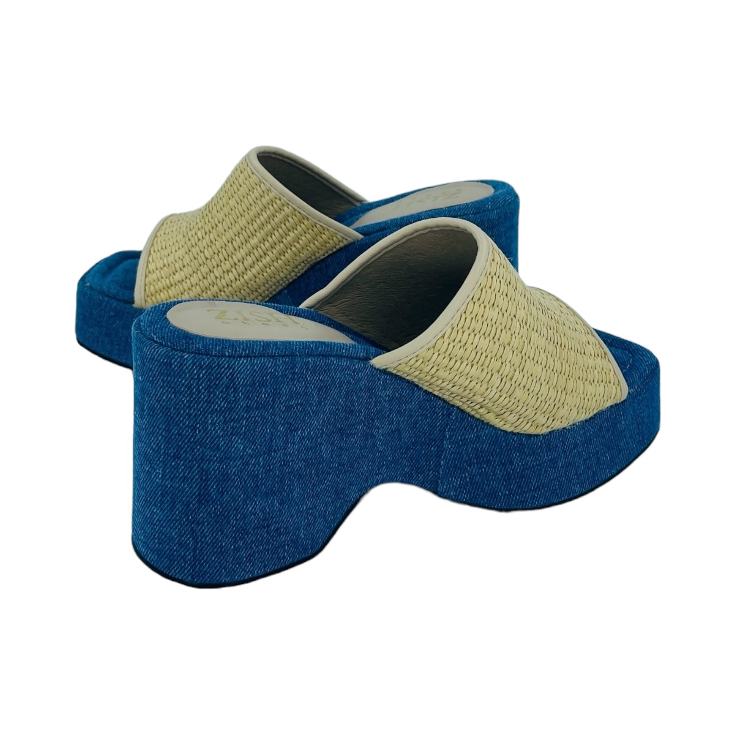 Blue platform slides with cane upper and denim blue sole, 3-inch heel, open toe design.